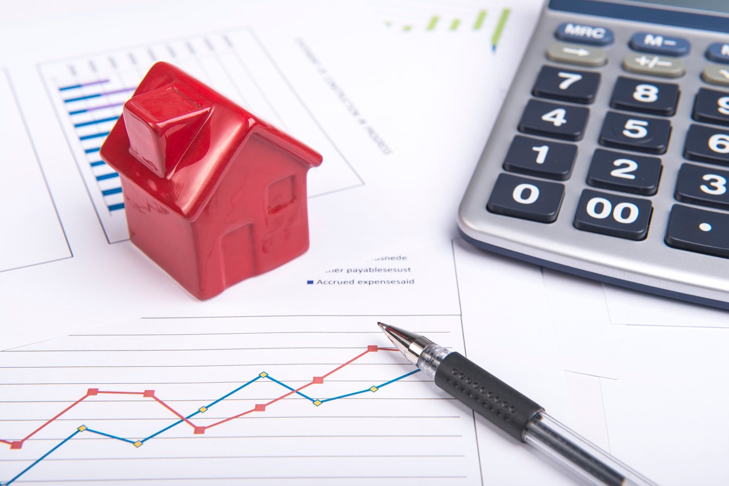 income statement Graphs and house,Housing market concept